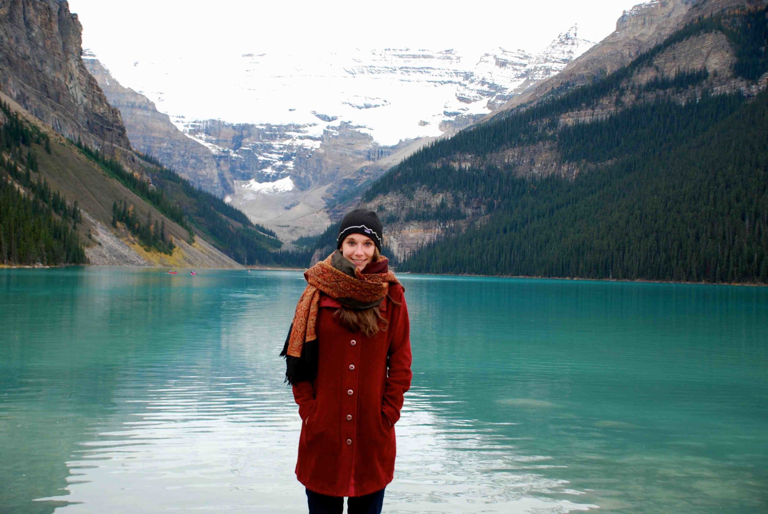 The author, bundled in her winter coat, scarf and hat, at Lake Louise. IRT photo by Belinda
