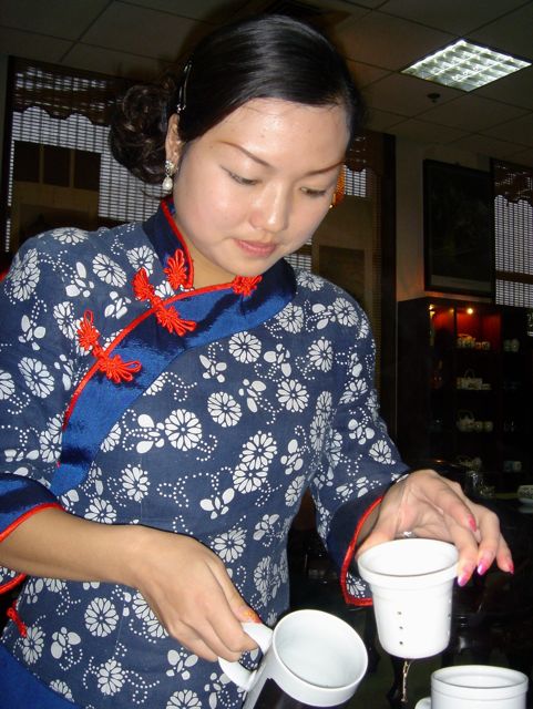 Chinese waitress on the Shangri-La Express