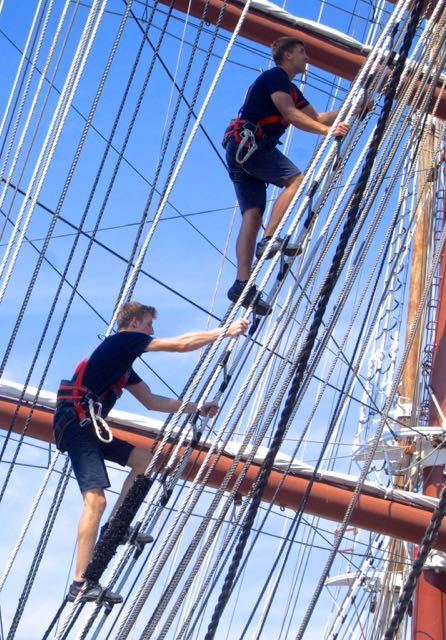 Sea Cloud sailors climb the ratlines. IRT Photo by R. Fisher