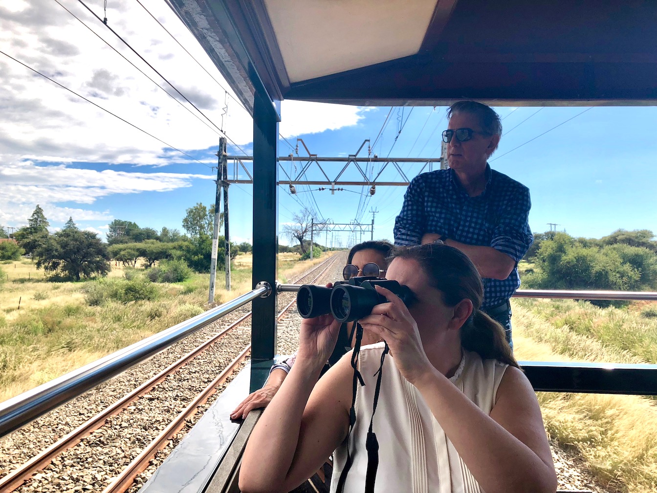 Rovos Rail looking through binoculars.