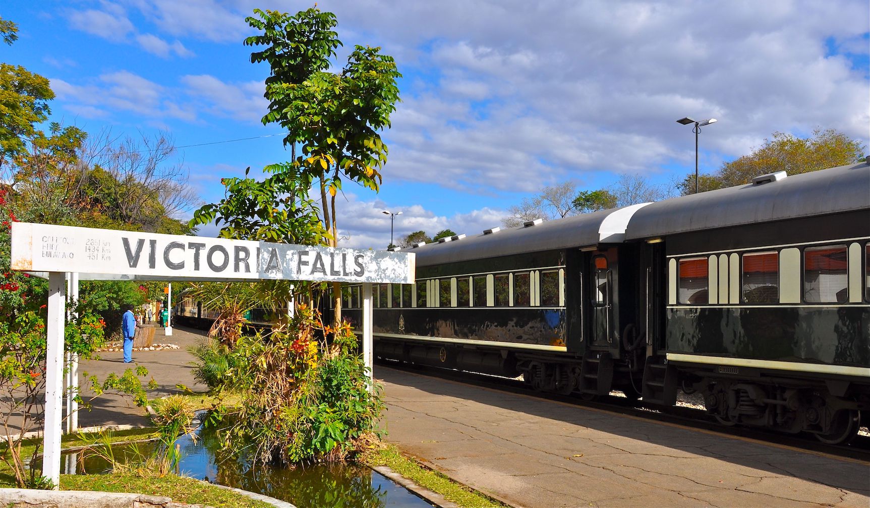 Zimbabwe. Victoria Falls. Steam train. Man looking out of window