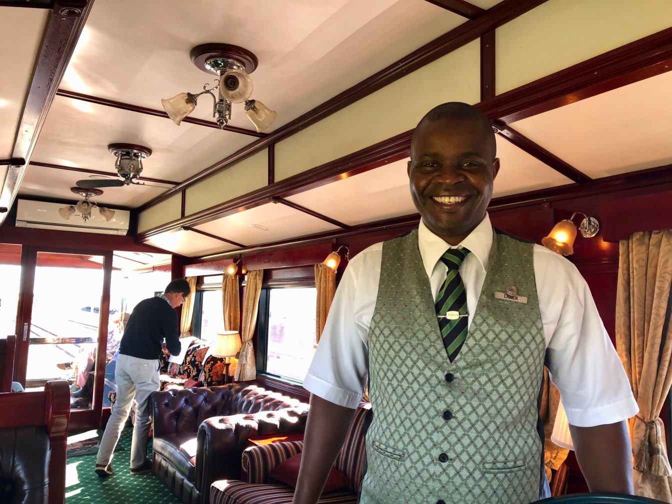 Rovos Rail staff in lounge car.