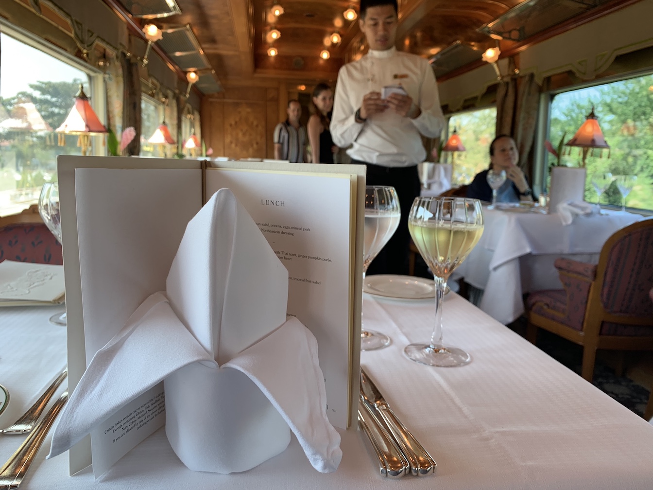 Server in dining car on Eastern & Oriental Express
