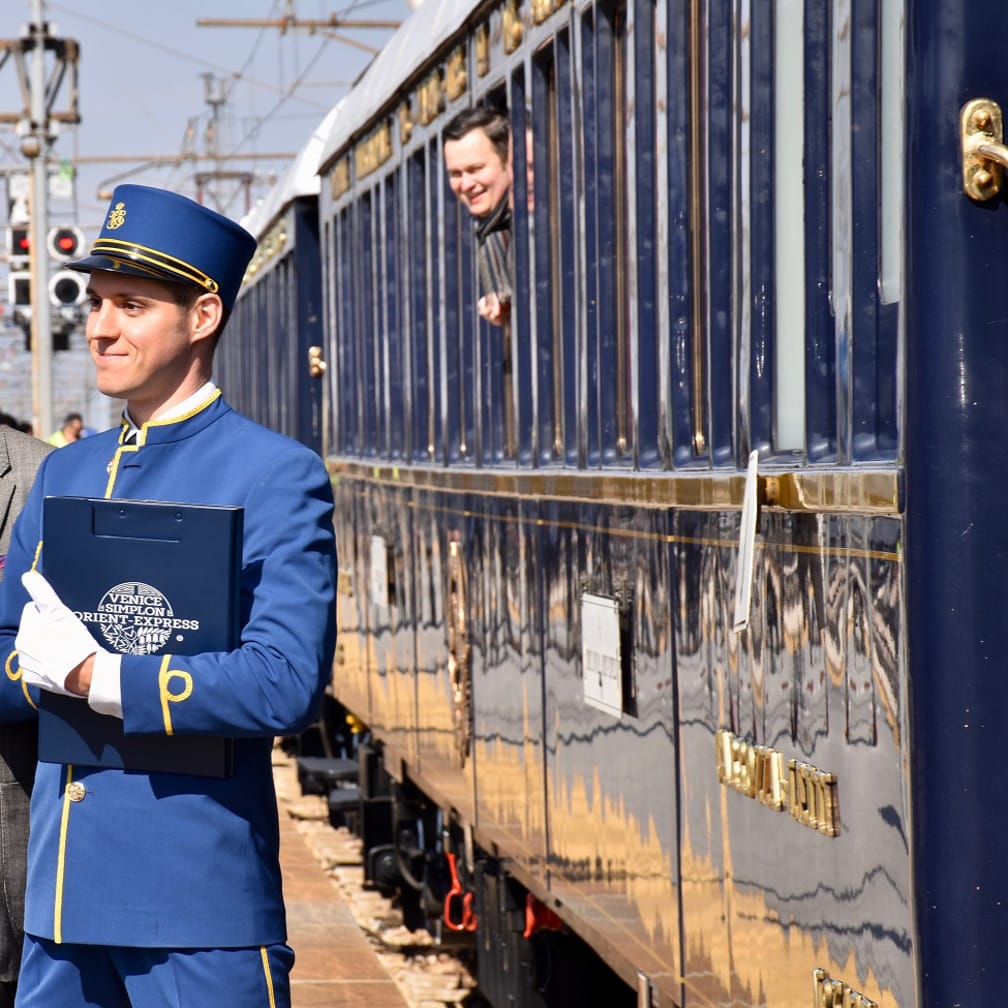 Steward standing by train on the Paris to Istanbul Annual Journey on the Venice Simplon-Orient-Express journey