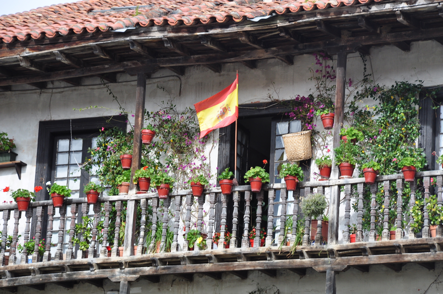 Spanish flag in Santillana on the El Transcantábrico Gran Lujo: Santiago-San Sebastián Luxury Train journey