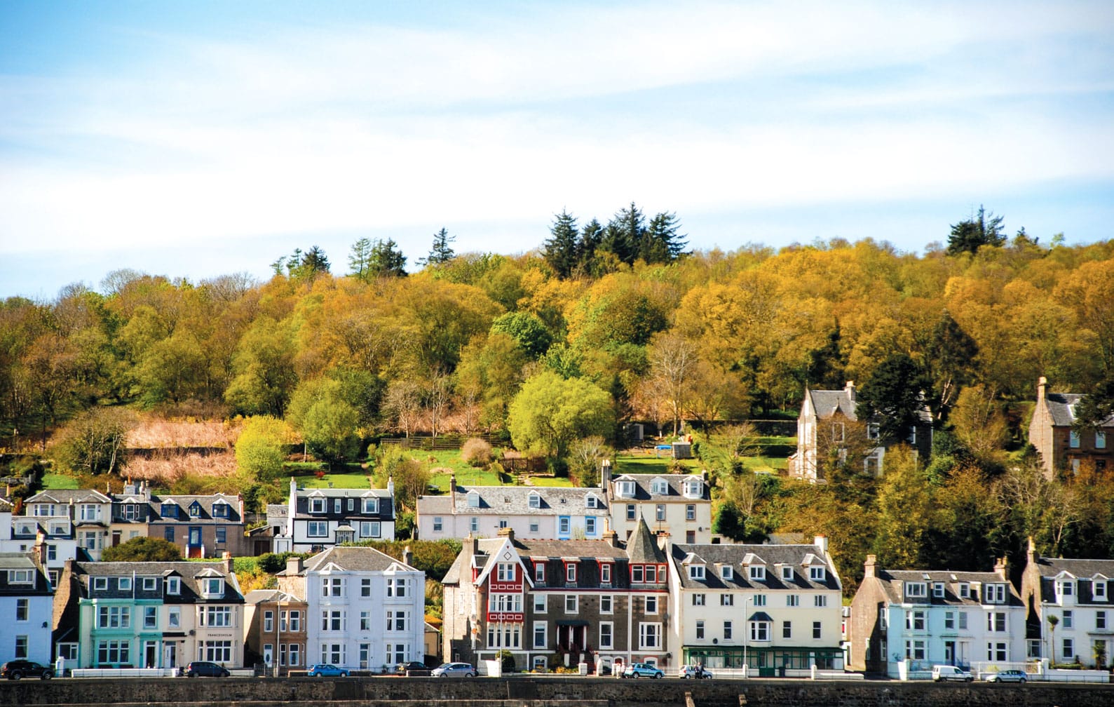 Houses by hillside on the Western Scenic Wonders journey