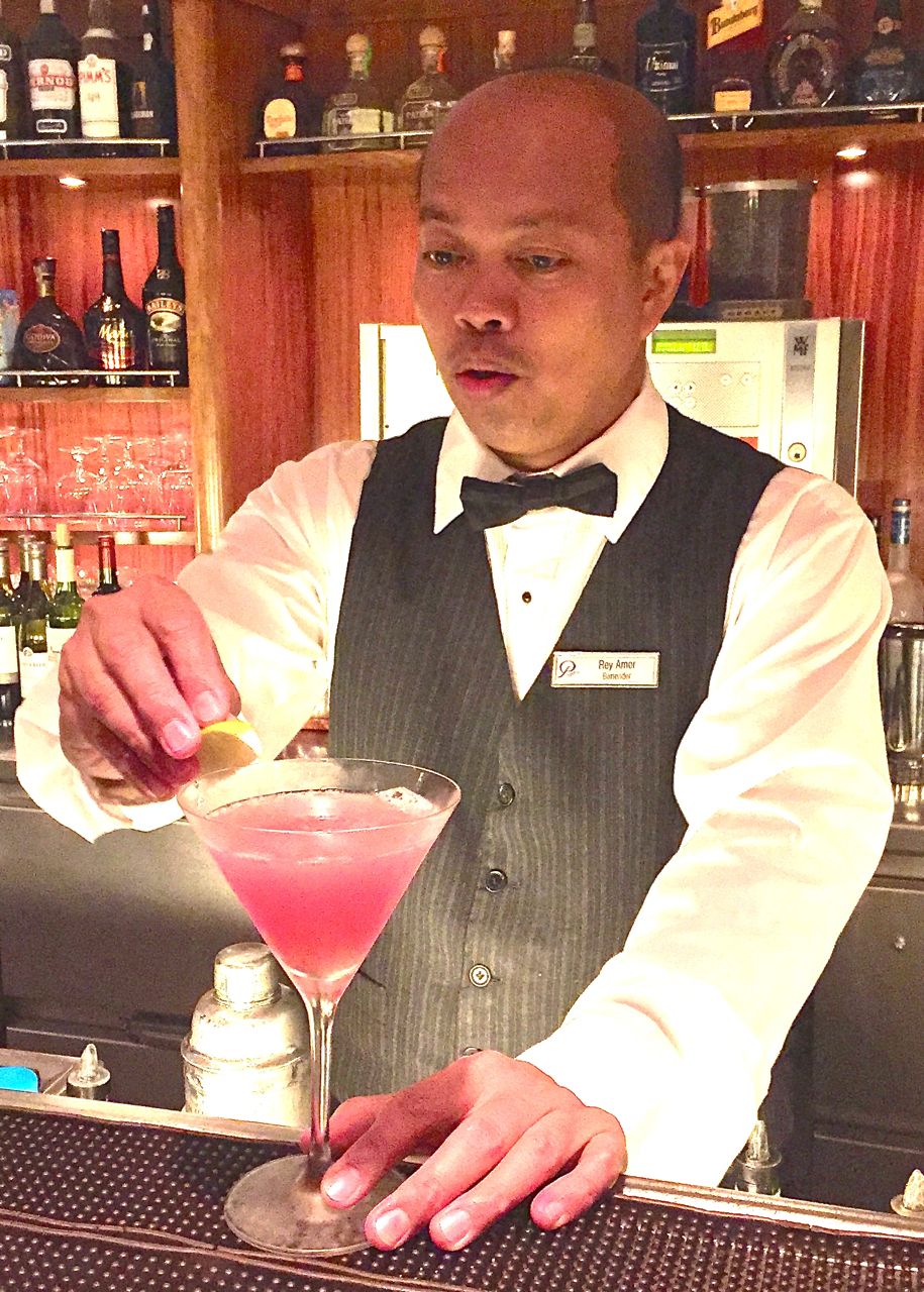 Bartender Rey Amor practices his delicate art. IRT Photo by Angela Walker