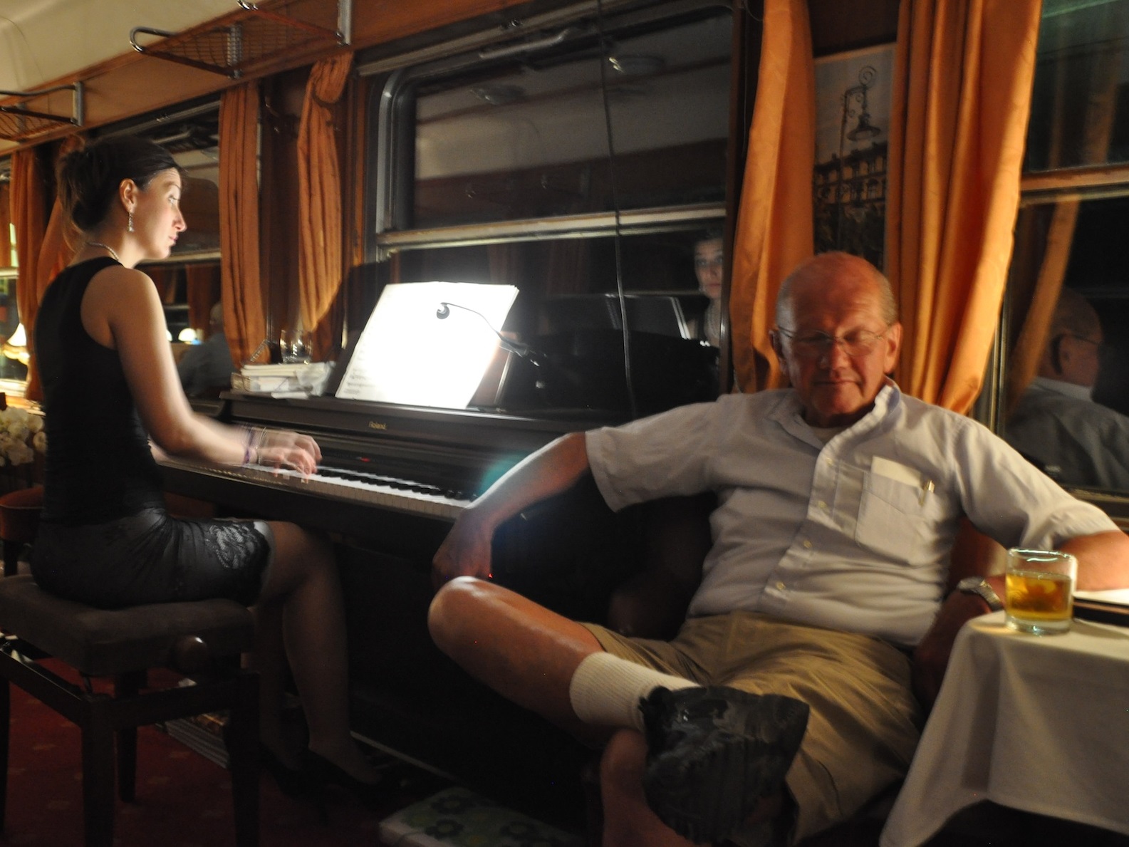 Enjoying music in the bar car.