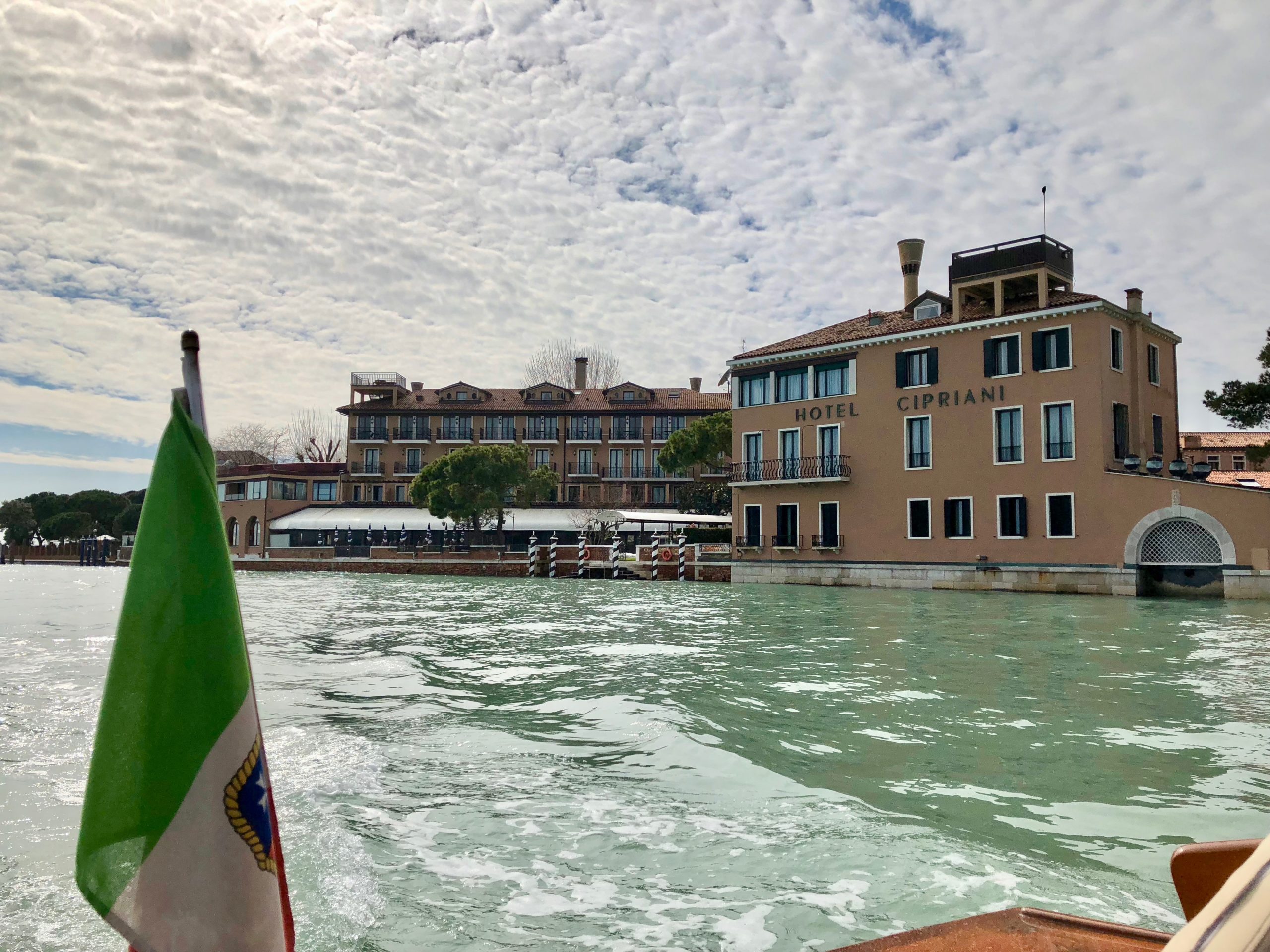 cipriani from lagoon with flag