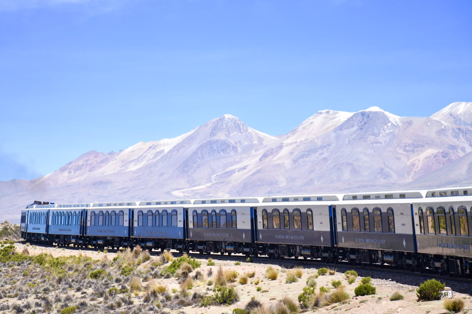 Belmond Andean Explorer train with mountains in the background