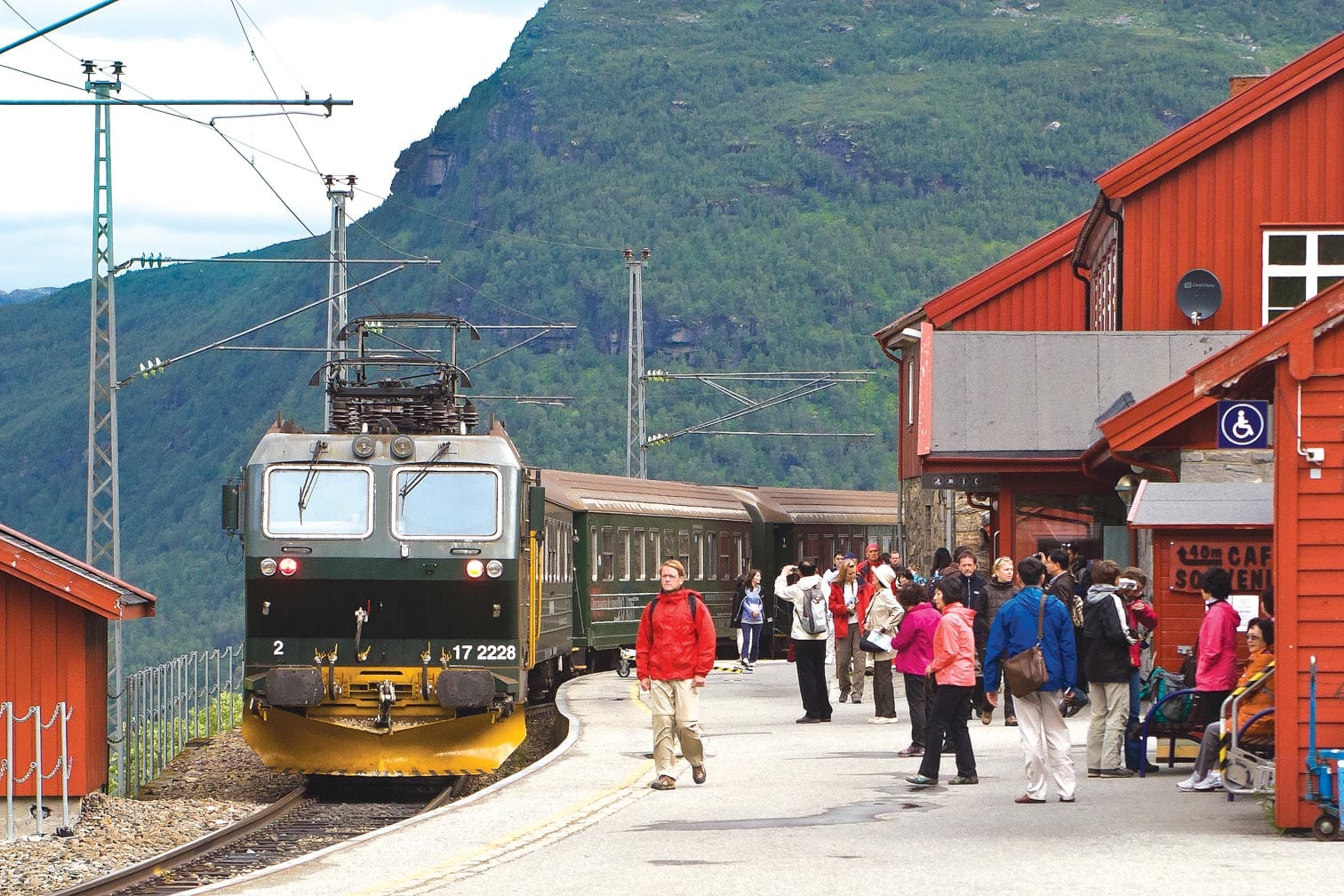 Flam Railway train stopping at a station