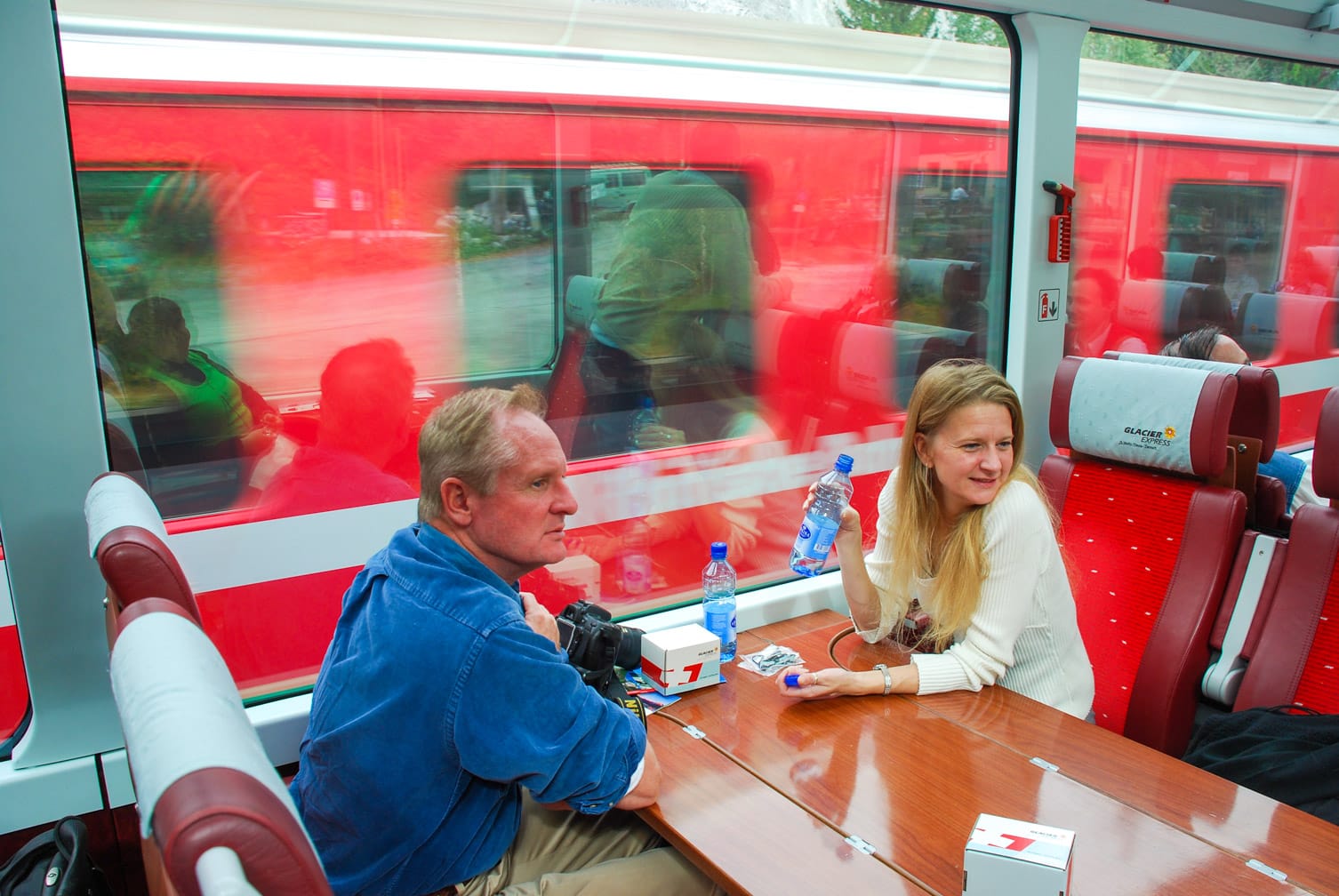 Guests drinking water on the Glacier Express train