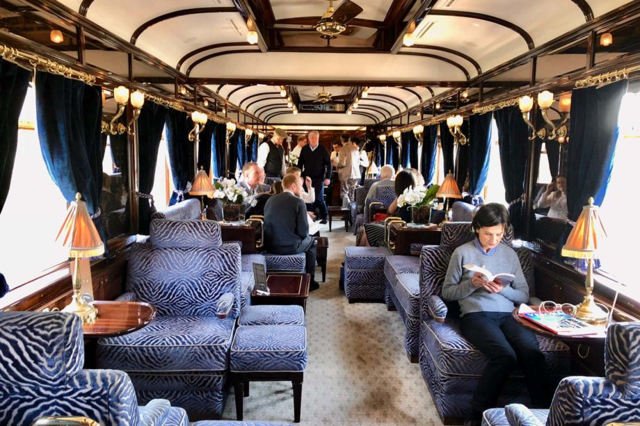 Guests reading in the Venice Simplon-Orient-Express (VSOE) train