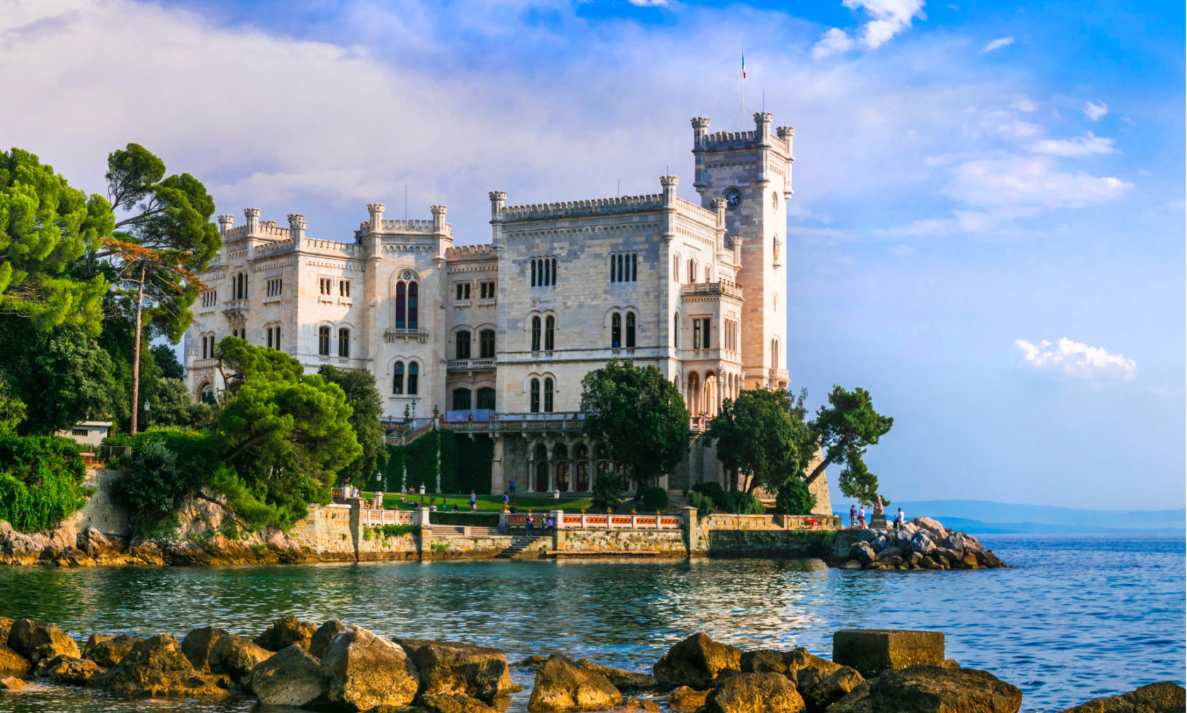 White castle on the rocky bank of Trieste, Italy.